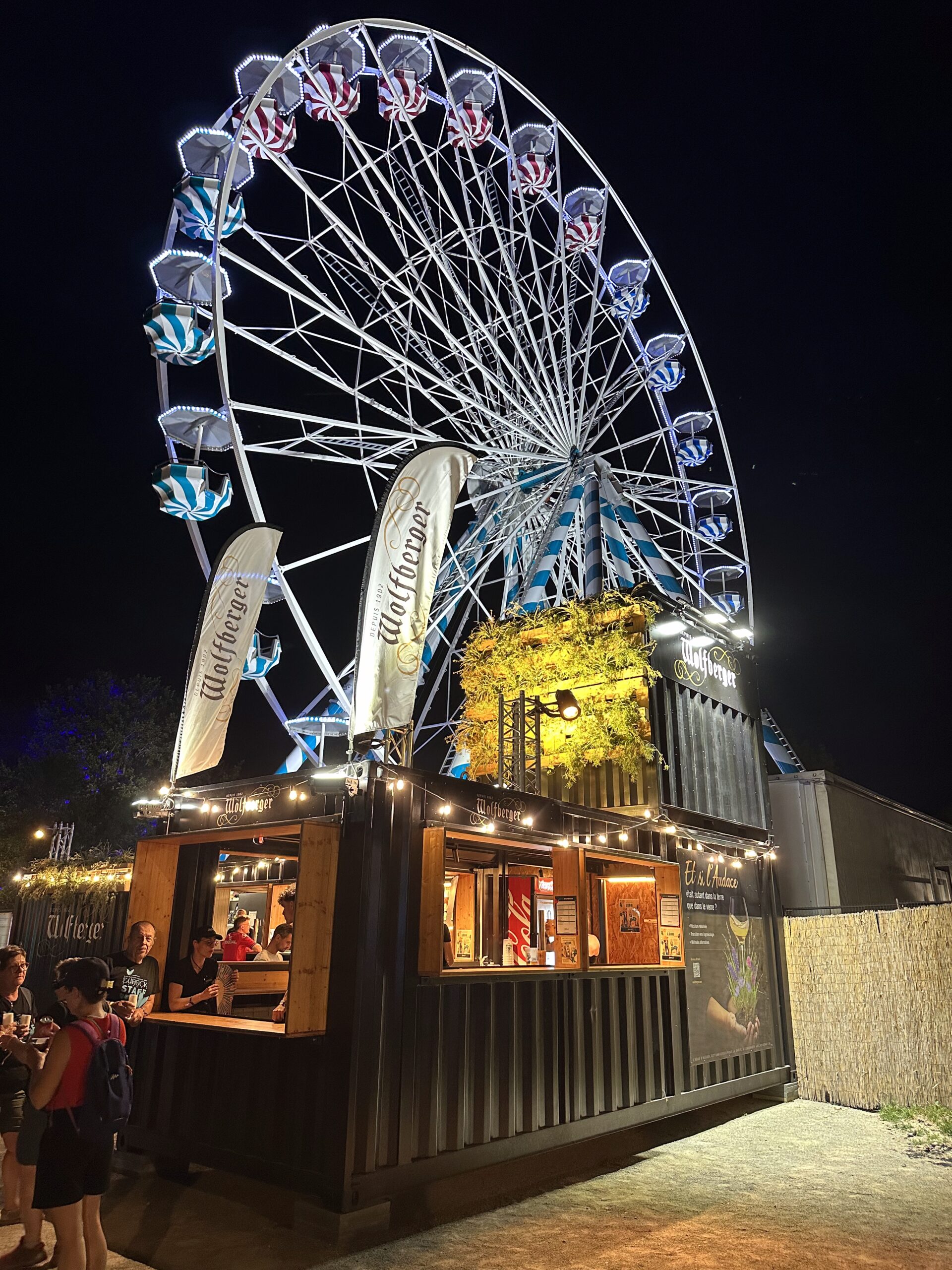Prestation technique mise en lumière et la création d'un mur végétal Eurockéennes de Belfort 2026 stand Wolfberger